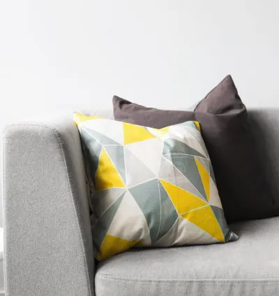 Modern grey couch and pillows